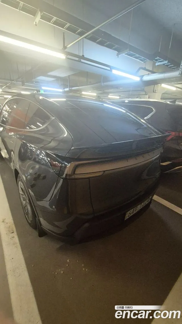 Tesla Model Y — Фото автомобиля 5