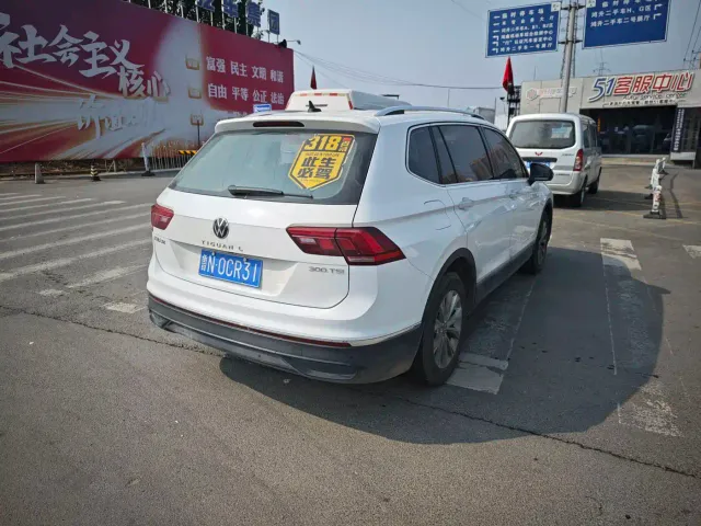 Volkswagen Tiguan L — Фото автомобиля 7