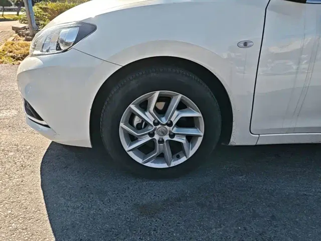 Nissan Tiida — Фото автомобиля 22