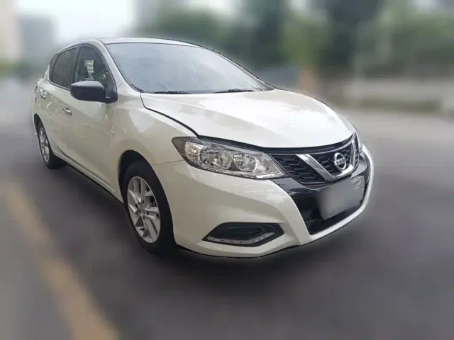 Nissan Tiida — Фото автомобиля 23