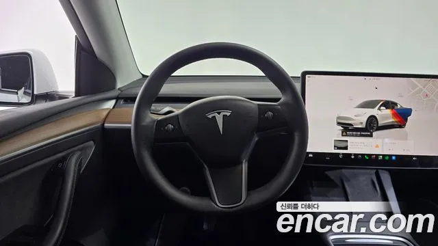 Tesla Model Y — Фото автомобиля 19