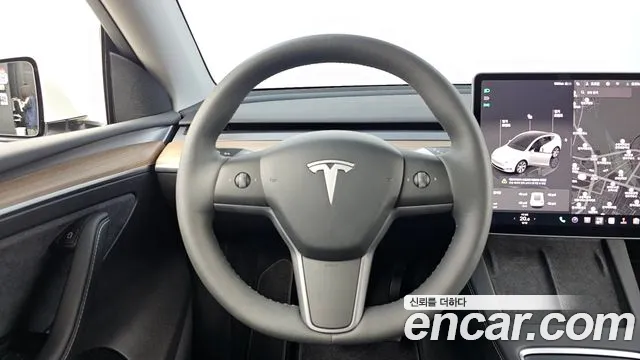 Tesla Model Y — Фото автомобиля 19