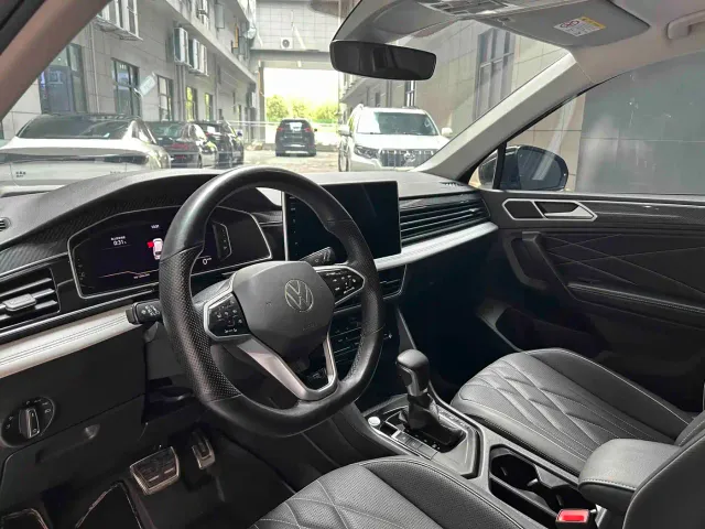 Volkswagen Tiguan L — Фото автомобиля 10