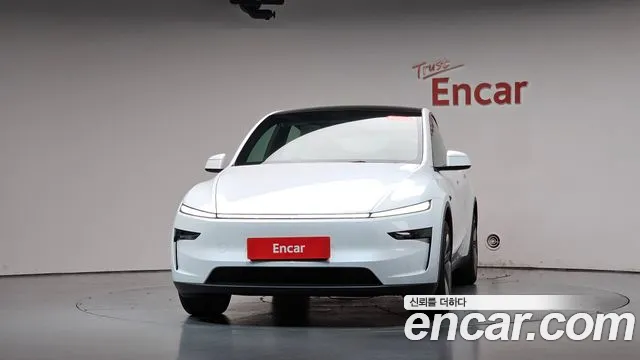Tesla Model Y — Фото автомобиля 3