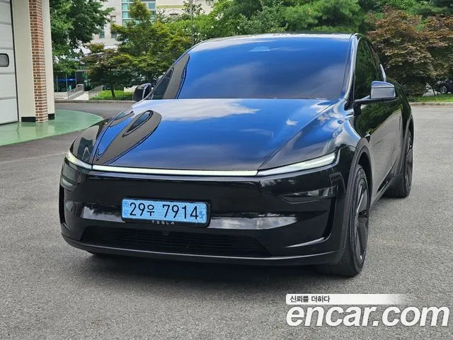 Tesla Model Y — Фото автомобиля 3