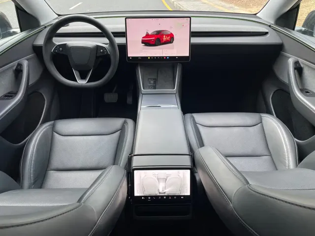 Tesla Model Y — Фото автомобиля 10