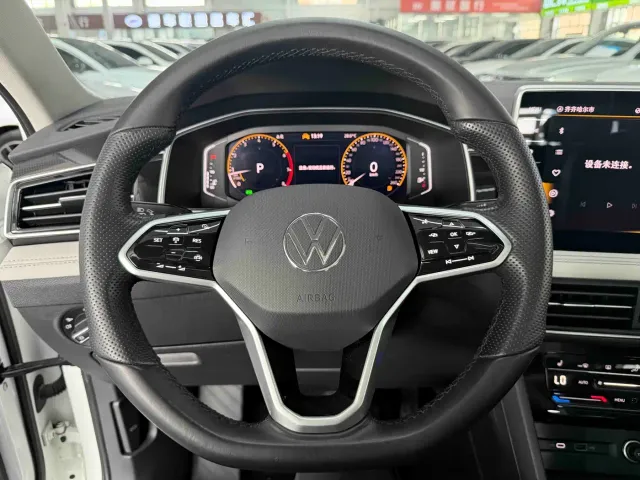 Volkswagen Tiguan L — Фото автомобиля 11