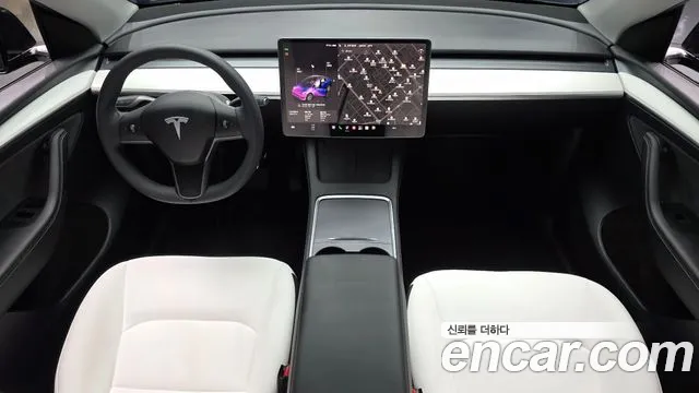 Tesla Model Y — Фото автомобиля 10