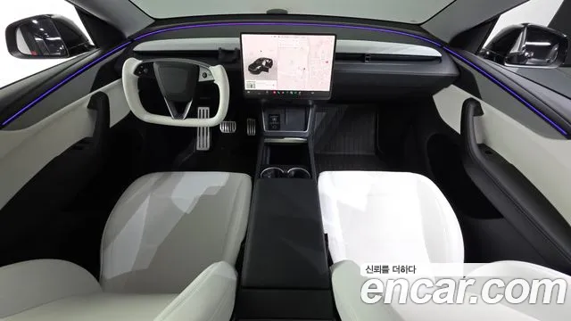Tesla Model Y — Фото автомобиля 10
