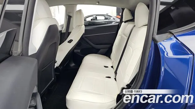 Tesla Model Y — Фото автомобиля 21