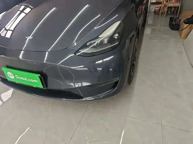 Tesla Model Y — Фото автомобиля 23