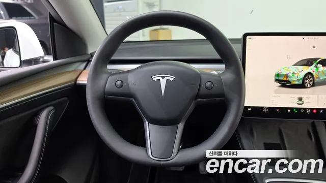 Tesla Model Y — Фото автомобиля 19