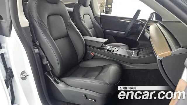 Tesla Model Y — Фото автомобиля 15