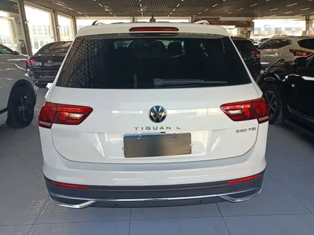 Volkswagen Tiguan L — Фото автомобиля 5