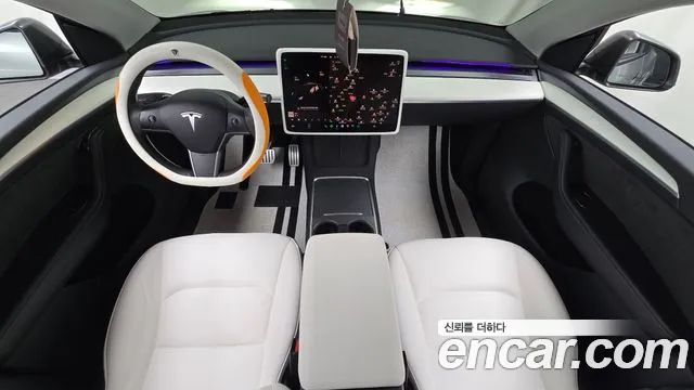 Tesla Model Y — Фото автомобиля 10