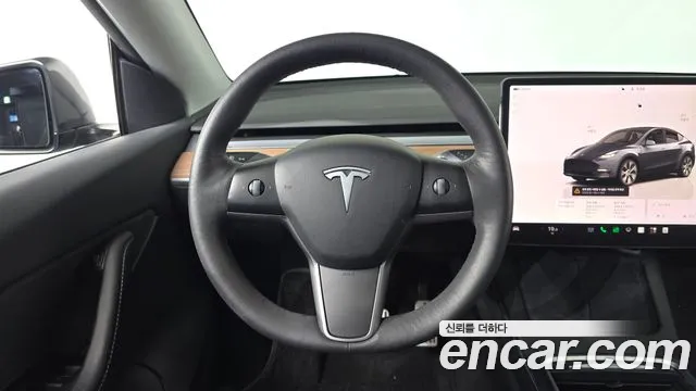 Tesla Model Y — Фото автомобиля 13