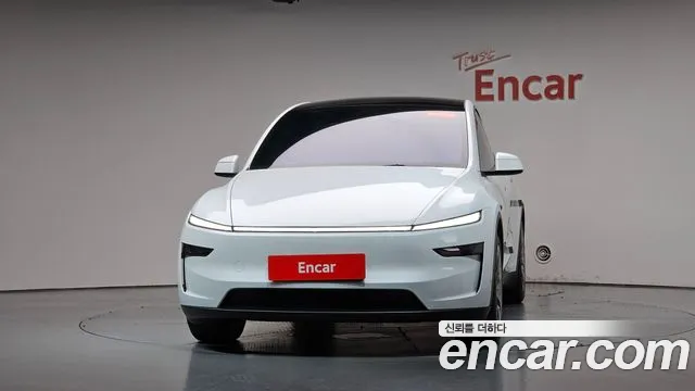 Tesla Model Y — Фото автомобиля 3