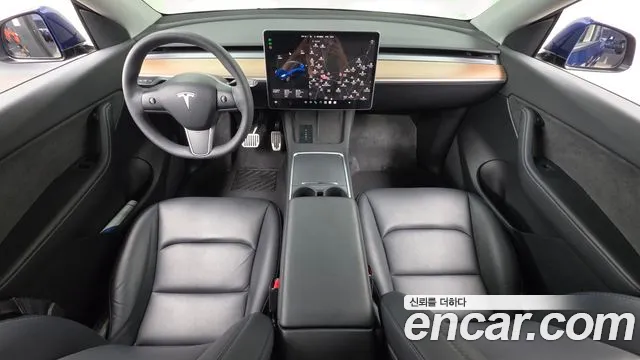 Tesla Model Y — Фото автомобиля 10