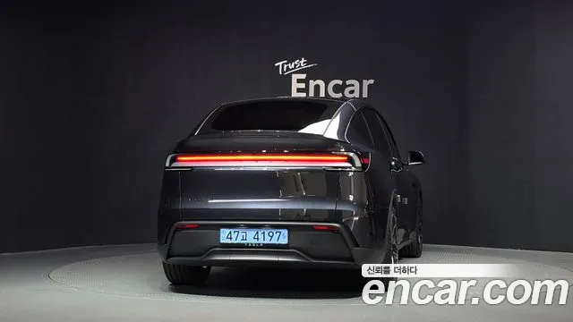 Tesla Model Y — Фото автомобиля 4