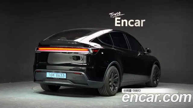Tesla Model Y — Фото автомобиля 2