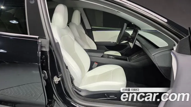 Tesla Model 3 — Фото автомобиля 4