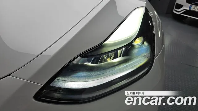 Tesla Model Y — Фото автомобиля 6