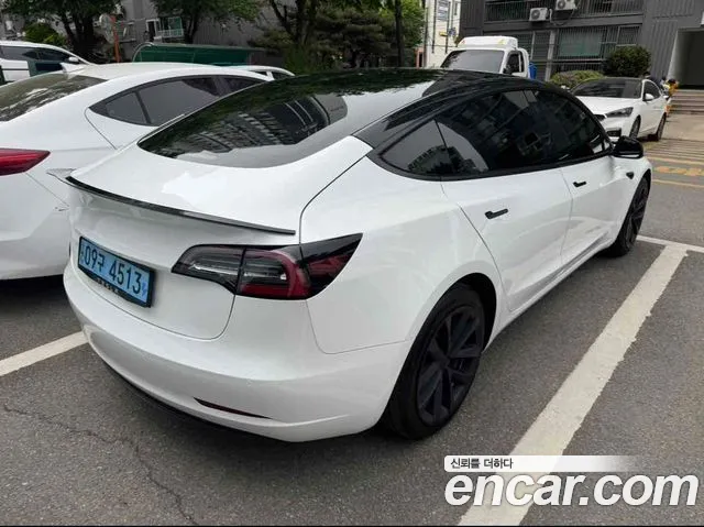 Tesla Model 3 — Фото автомобиля 2