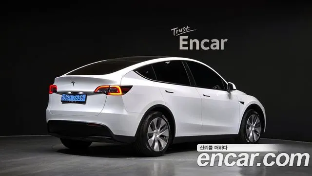 Tesla Model Y — Фото автомобиля 2