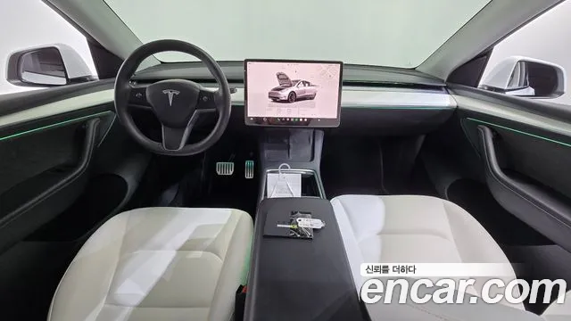 Tesla Model Y — Фото автомобиля 10