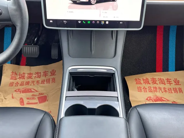 Tesla Model Y — Фото автомобиля 13