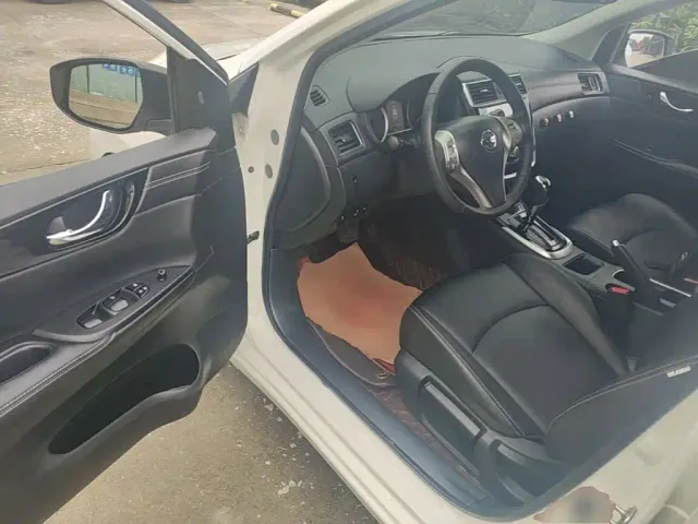 Nissan Tiida — Фото автомобиля 15