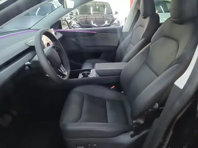 Tesla Model Y — Фото автомобиля 14