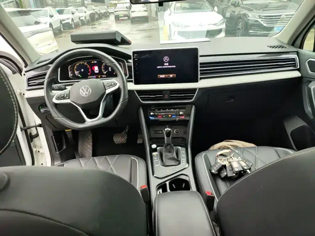 Volkswagen Tiguan L — Фото автомобиля 9