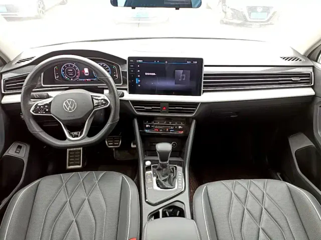 Volkswagen Tiguan L — Фото автомобиля 9
