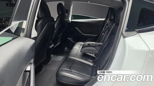 Tesla Model Y — Фото автомобиля 10