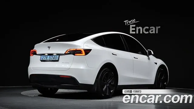 Tesla Model Y — Фото автомобиля 2