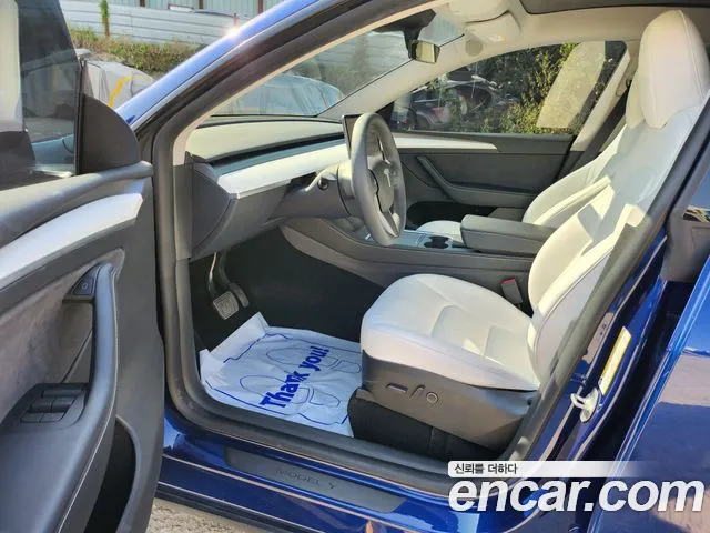 Tesla Model Y — Фото автомобиля 8