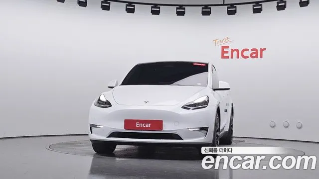 Tesla Model Y — Фото автомобиля 3