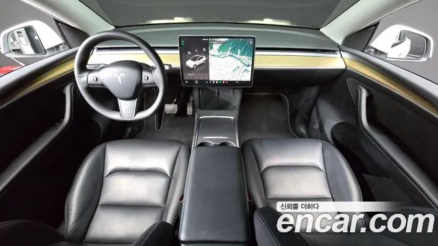 Tesla Model Y — Фото автомобиля 7