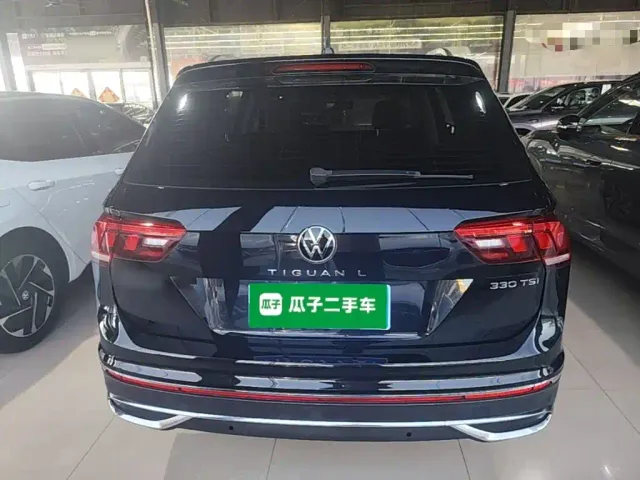 Volkswagen Tiguan L — Фото автомобиля 5
