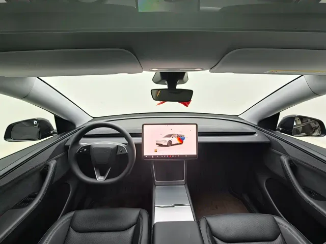 Tesla Model Y — Фото автомобиля 6