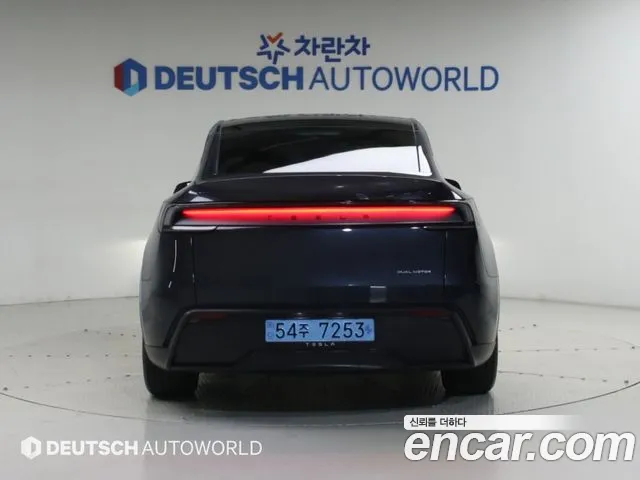 Tesla Model Y — Фото автомобиля 5