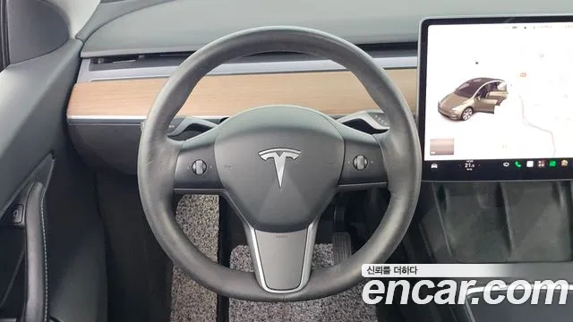 Tesla Model Y — Фото автомобиля 13