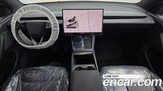 Tesla Model Y — Фото автомобиля 10