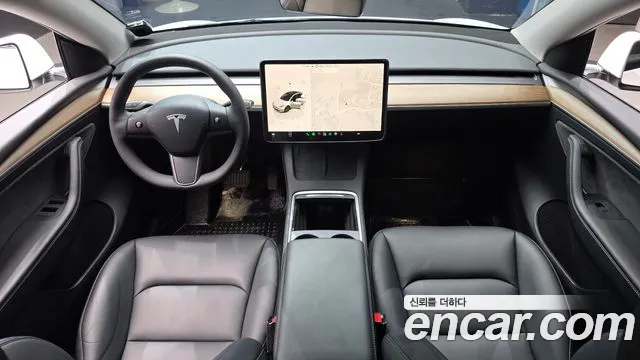 Tesla Model Y — Фото автомобиля 7