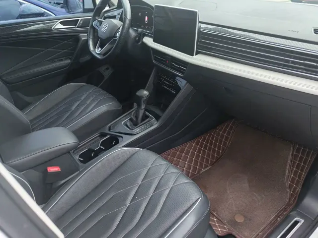 Volkswagen Tiguan L — Фото автомобиля 6
