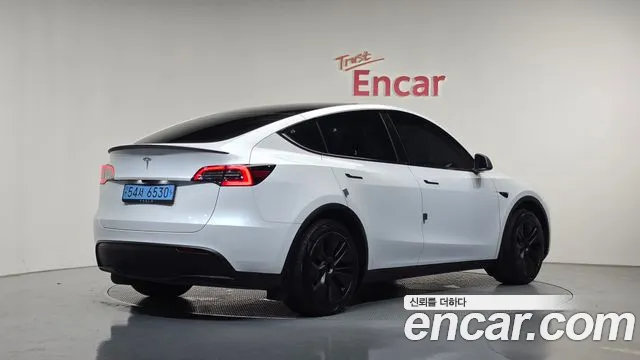 Tesla Model Y — Фото автомобиля 2