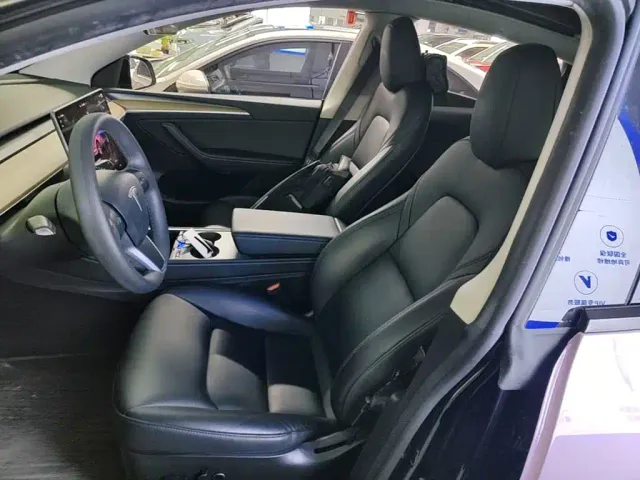 Tesla Model Y — Фото автомобиля 14