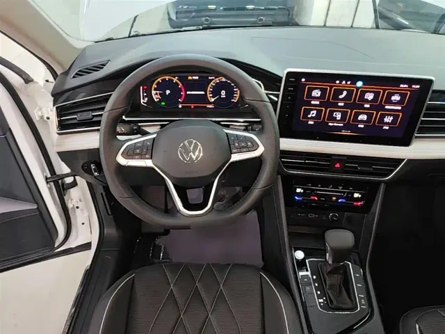 Volkswagen Tiguan L — Фото автомобиля 10