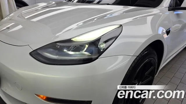 Tesla Model 3 — Фото автомобиля 7